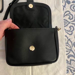 Never used dark navy leather Cole Haan crossbody and waist bag.